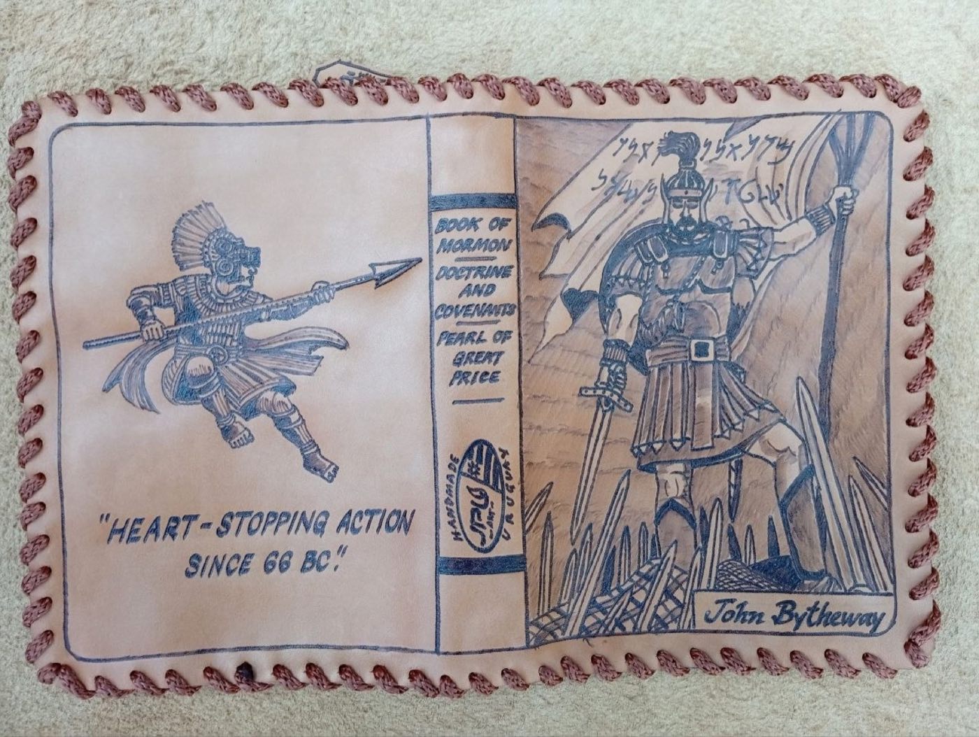 Open cowhide scripture cover for John Bytheway: a Nephite warrior with the line Heart-stopping action since 66 BC, the Book of Mormon spine, and Captain Moroni